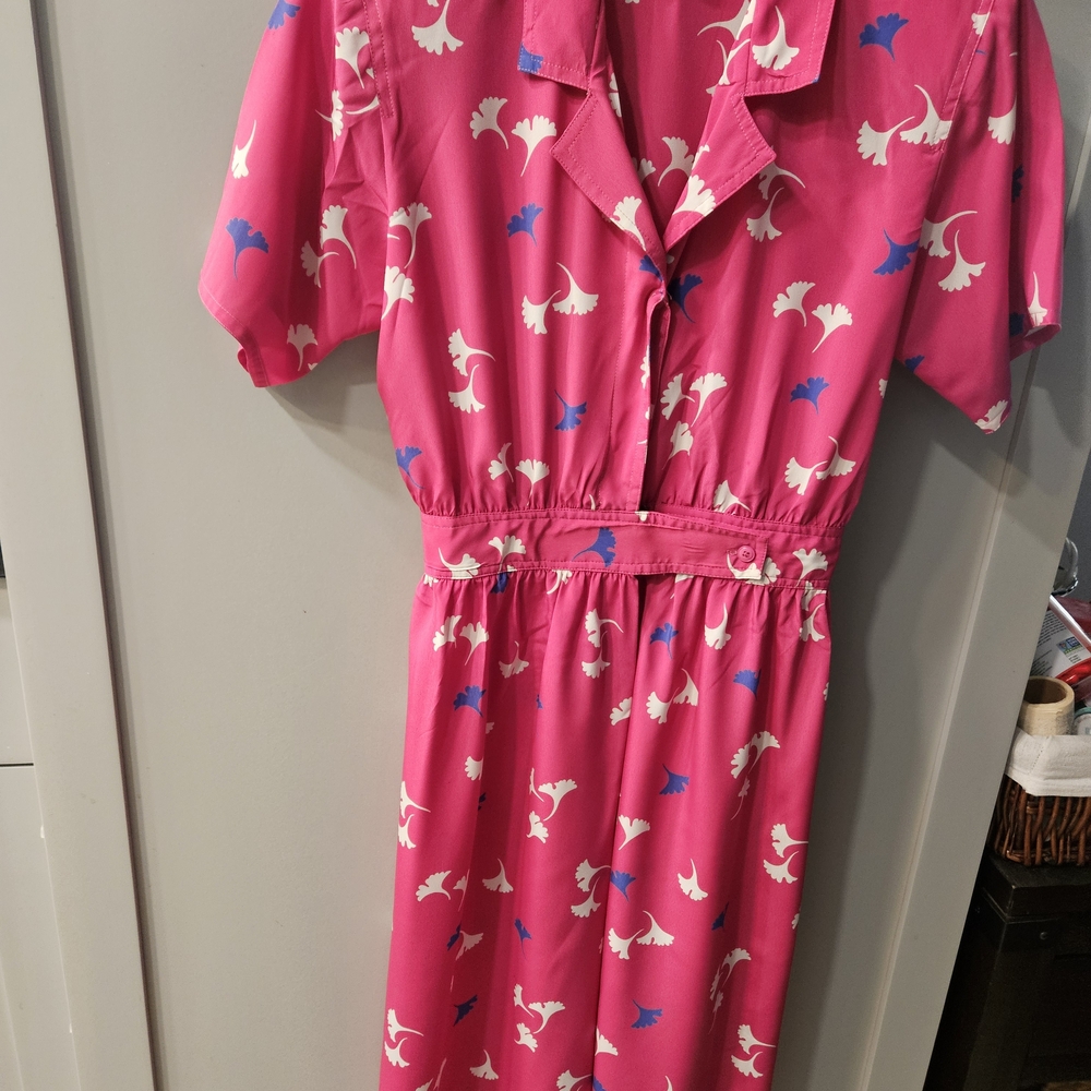 Vibrant Pink Dress with Floral Accents